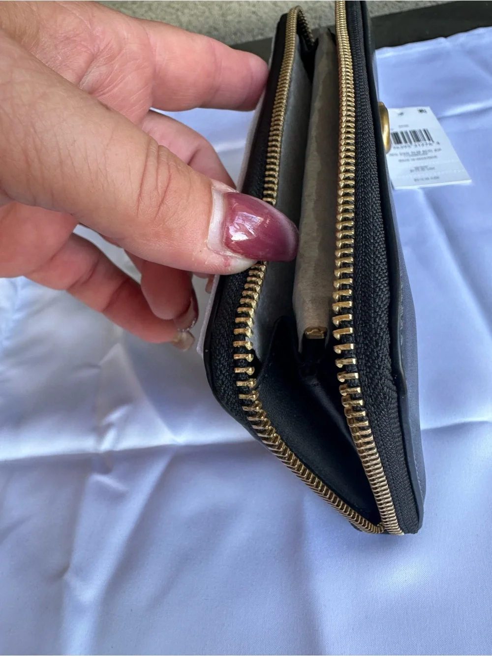 Coach Black Leather Zip Phone Wallet with Gold Tone Hardware